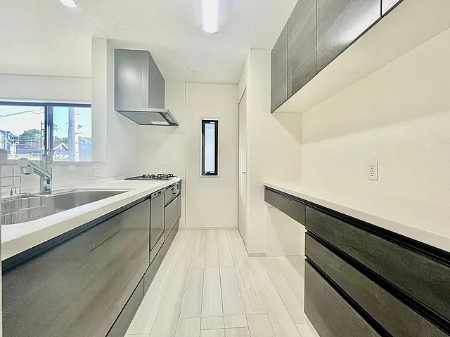 町田市上小山田町の中古戸建て10のキッチンの写真