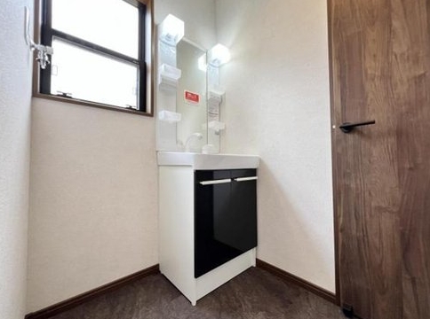 町田市山崎町の中古戸建ての洗濯機置場の写真