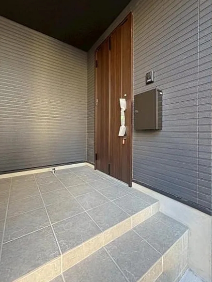 相模原市南区古淵6丁目の新築戸建て2の玄関の写真