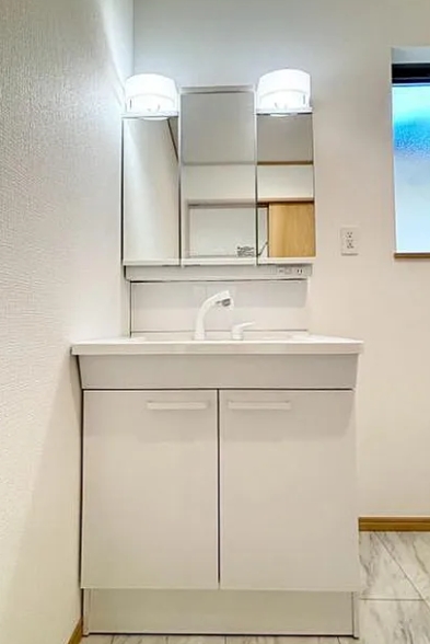 相模原市南区下溝の新築戸建てAの洗面化粧台の写真