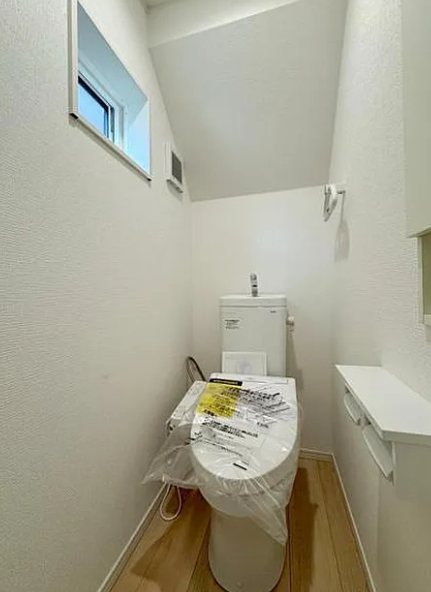 相模原市南区新戸の新築戸建て1のトイレ1Fの写真