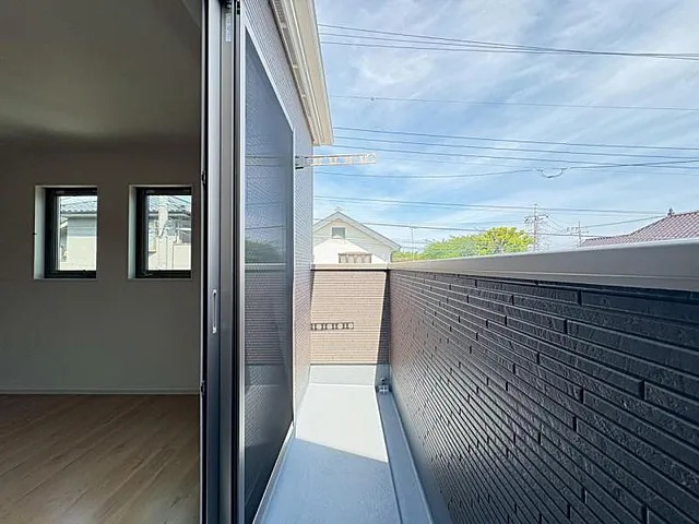 八王子市富士見町の新築戸建て1号棟のバルコニーの写真