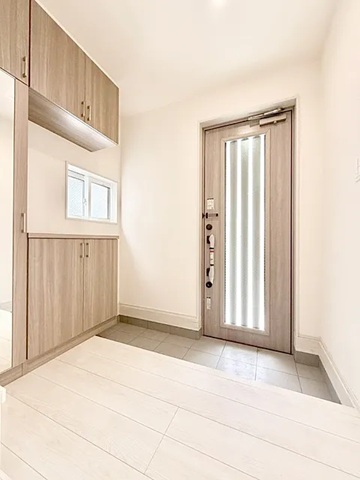 八王子市富士見町の新築戸建て1号棟の玄関の写真