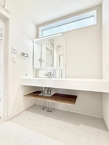 八王子市富士見町の新築戸建て1号棟の洗面化粧台の写真