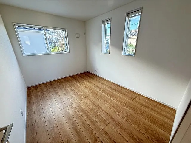 八王子市泉町の新築戸建て1号棟の洋室2の写真