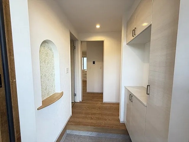 八王子市泉町の新築戸建て1号棟の玄関の写真