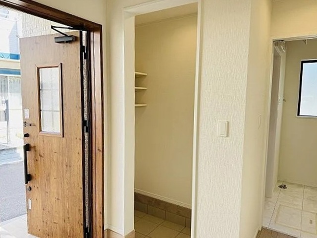 八王子市上壱分方町の新築戸建てF号棟の玄関の写真
