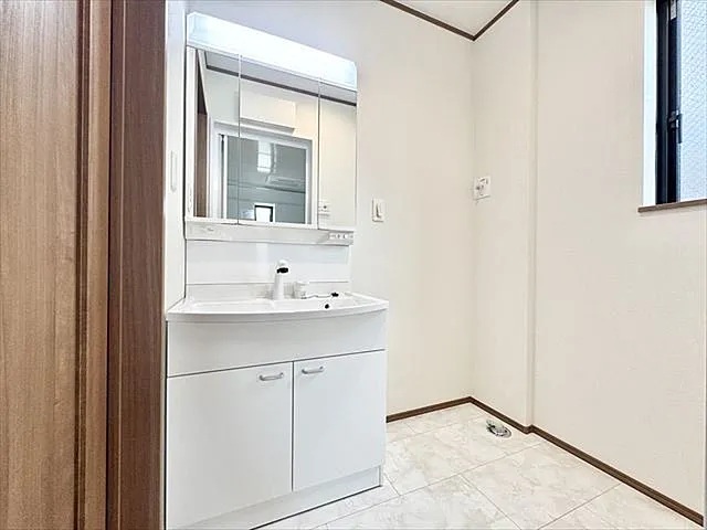 八王子市大和田町5丁目の新築戸建てA号棟の洗面化粧台の写真