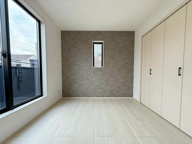 八王子市大和田町7丁目の新築戸建ての洋室1の写真