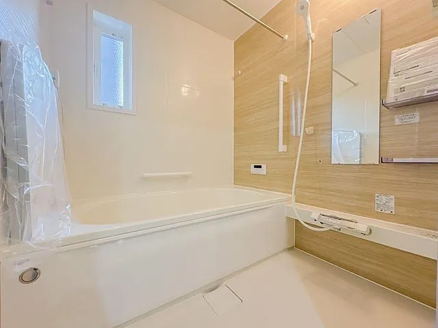 八王子市大谷町の新築戸建て9号棟のバスルームの写真