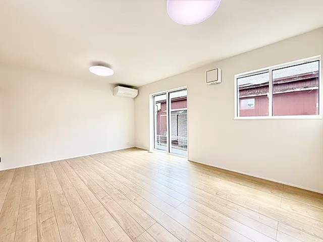 八王子市諏訪町の新築戸建てのリビングの写真