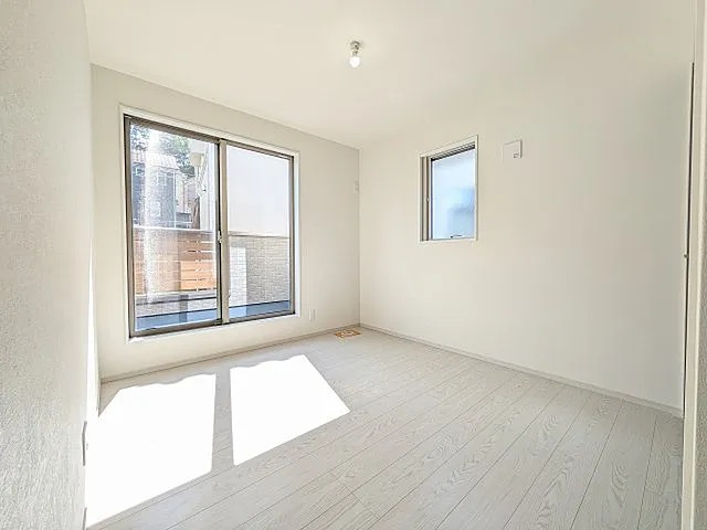八王子市館町の新築戸建て5号棟の洋室1の写真