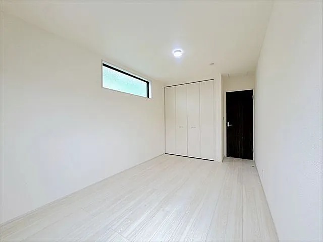 八王子市寺田町の新築戸建て1号棟の洋室1の写真
