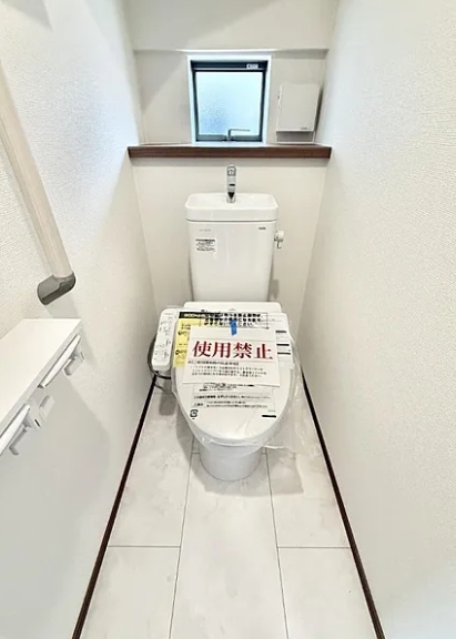 町田市成瀬2丁目の新築戸建てDのトイレ1Fの写真