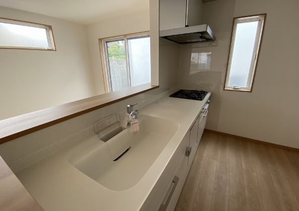 町田市小山町の新築戸建て10のキッチンの写真