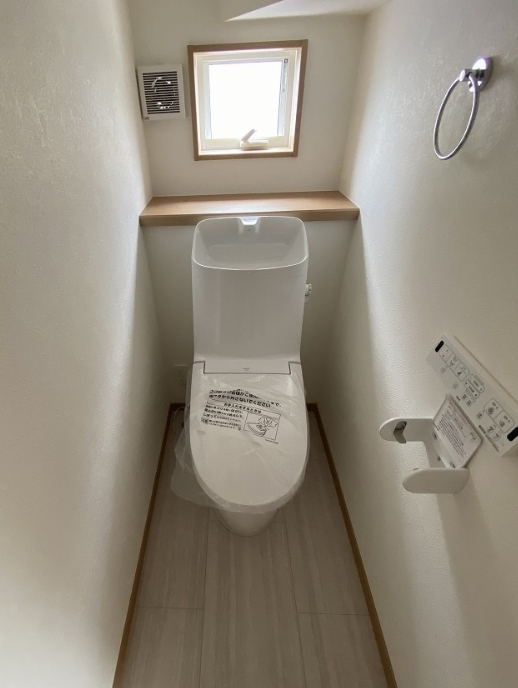 町田市小山町の新築戸建て10のトイレ1Fの写真