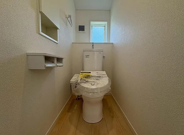 町田市鶴川4丁目の新築戸建て1のトイレ2Fの写真