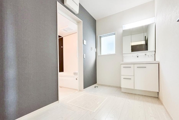 町田市鶴川4丁目の新築戸建て1の洗面化粧台の写真