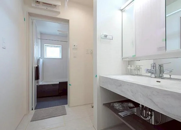 町田市図師町の新築戸建て6の洗面化粧台の写真