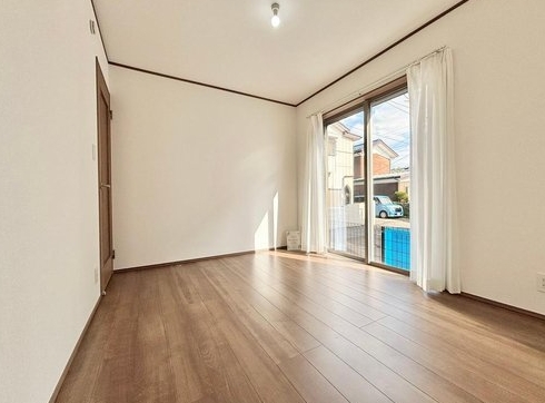 相模原市南区上鶴間8丁目の新築戸建ての洋室1の写真