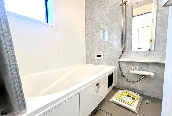 町田市本町田の新築戸建て1号棟のバスルームの写真