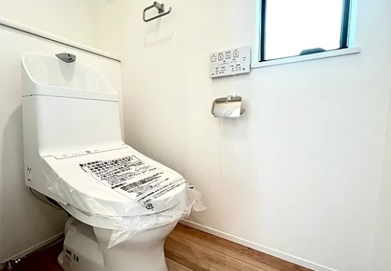 町田市本町田の新築戸建て1号棟のトイレ1Fの写真