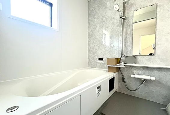 町田市本町田の新築戸建て3号棟のバスルームの写真