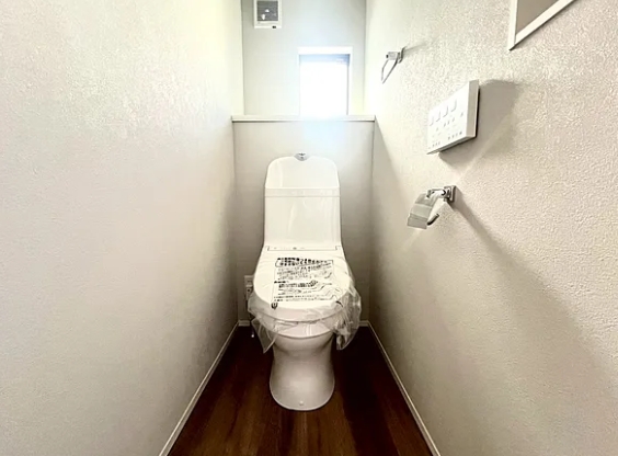 町田市本町田の新築戸建て4号棟のトイレ1Fの写真