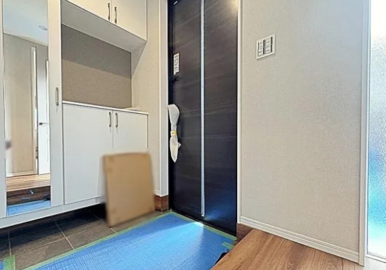町田市本町田の新築戸建て1号棟の玄関の写真