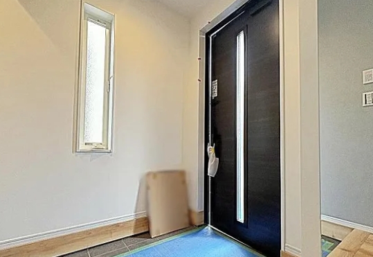 町田市本町田の新築戸建て2号棟の玄関の写真