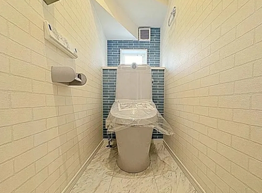 町田市本町田の新築戸建て2号棟のトイレ1Fの写真