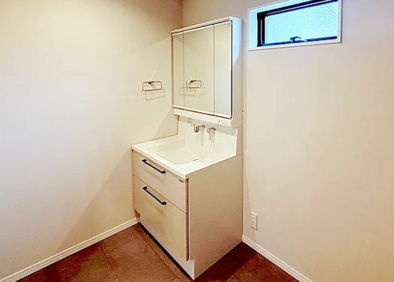 町田市木曽東1丁目の新築戸建てEの洗面化粧台1fの写真