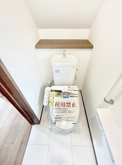 町田市成瀬2丁目の新築戸建てAのトイレ1Fの写真