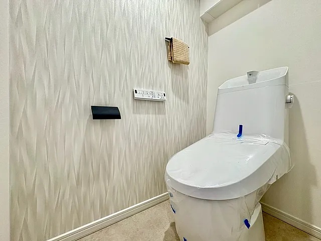 町田市小山ヶ丘1丁目の中古マンション9階部分のトイレの写真