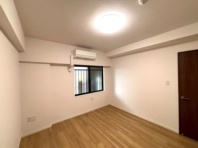 町田市小山ヶ丘5丁目の中古マンション7階部分の洋室1の写真