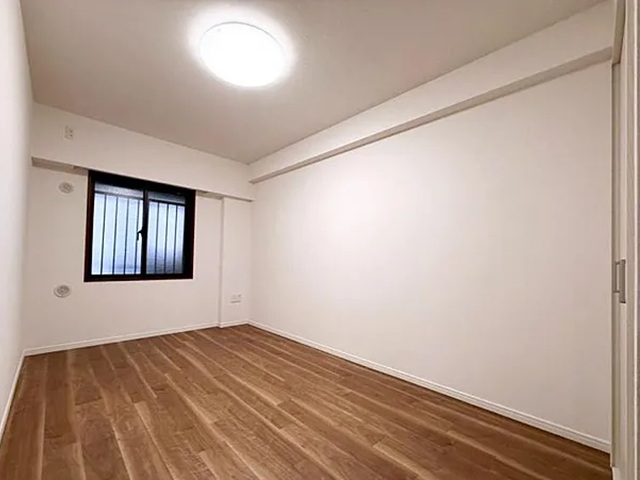 町田市小山ヶ丘5丁目の中古マンション7階部分の洋室1の写真