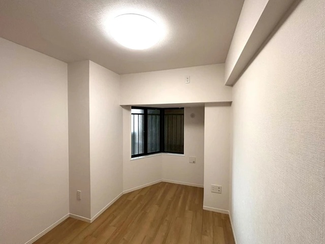 町田市小山ヶ丘5丁目の中古マンション7階部分の洋室2の写真