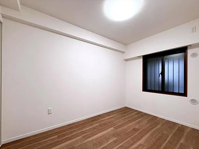 町田市小山ヶ丘5丁目の中古マンション7階部分の洋室2の写真