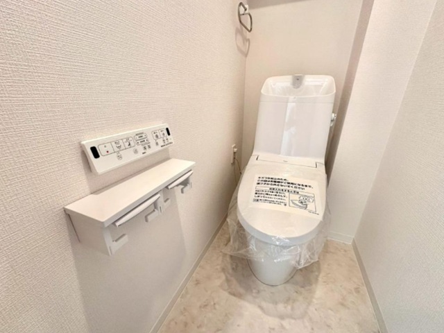 町田市小山ヶ丘5丁目の中古マンション7階部分のトイレの写真