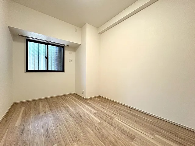 町田市小山ヶ丘6丁目の中古マンション1階部分の洋室1の写真