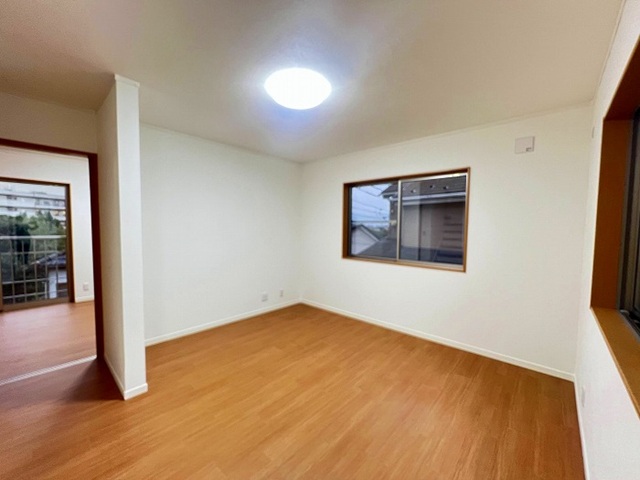 町田市小山町の中古戸建てのリビングの写真