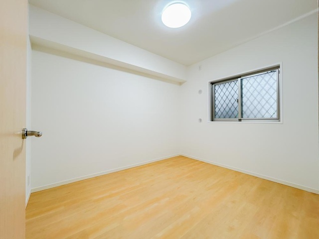 町田市忠生2丁目の中古マンション1階部分の洋室2の写真