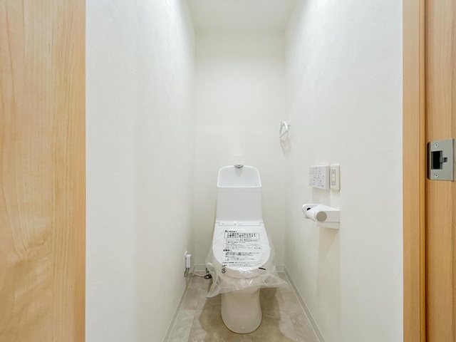 町田市忠生2丁目の中古マンション1階部分のトイレの写真