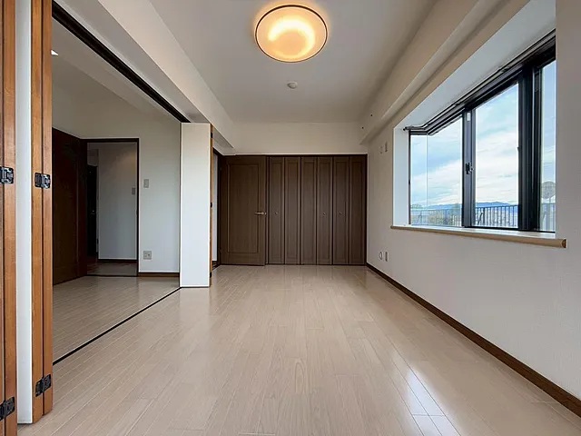 町田市忠生2丁目の中古マンション5階部分の洋室1の写真