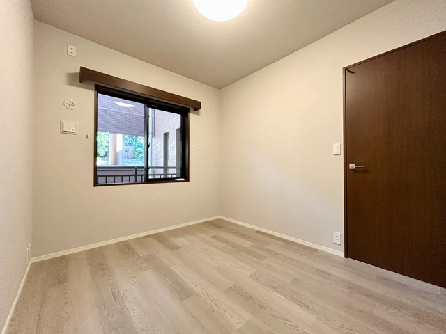 町田市玉川学園5丁目の中古マンション1階部分の洋室2の写真