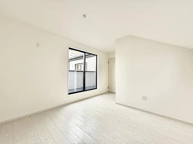 町田市鶴川6丁目の新築戸建ての洋室1の写真