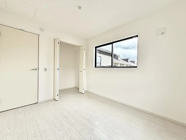 町田市鶴川6丁目の新築戸建ての洋室2の写真
