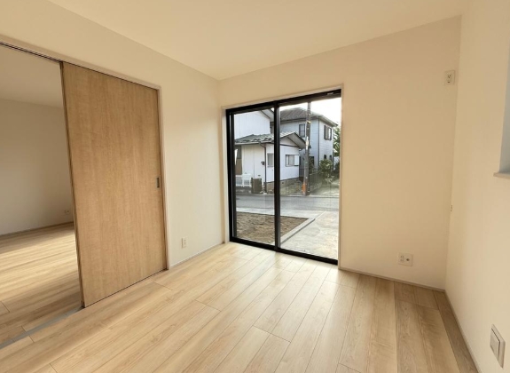 相模原市中央区上溝の新築戸建ての洋室1の写真