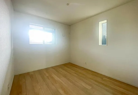 相模原市中央区上溝の新築戸建て3号棟の洋室2の写真