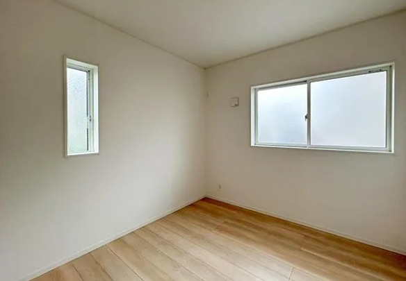 相模原市中央区共和3丁目の新築戸建て1号棟の洋室1の写真